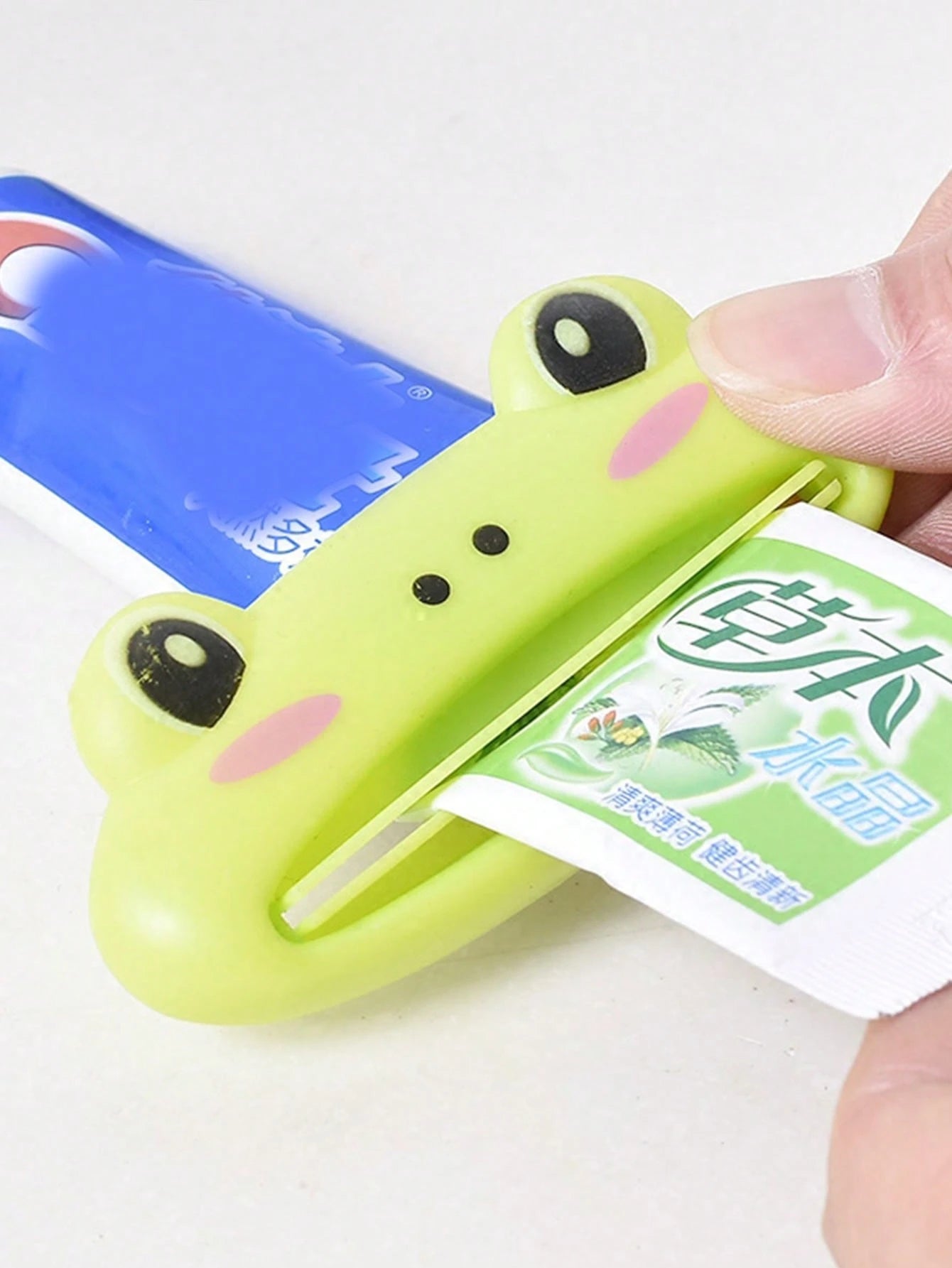 1pc Cartoon Toothpaste Squeezer, Multi-Function Makeup Tool