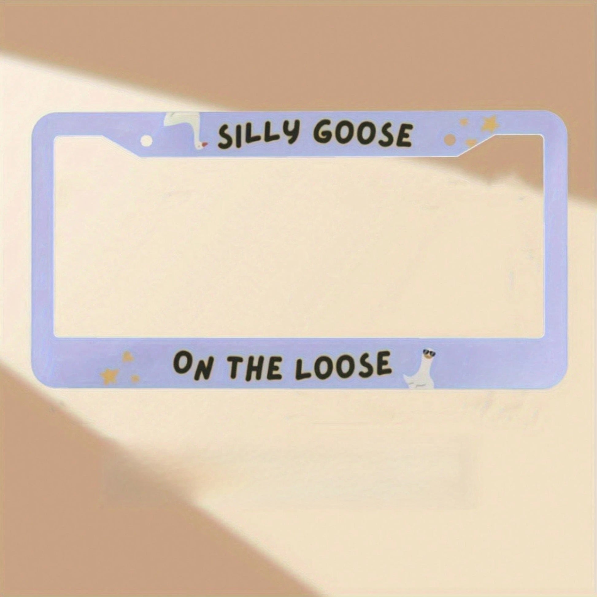 1PC Soft Blue "Silly Goose Escapes" License Plate Frame- Plastic- Vibrant- Easy To Install- Standard Size Fits Most Vehicles- Novelty Decoration For Car Enthusiasts 12. 2X 6. 3inch 31. 3x 16cm Ch