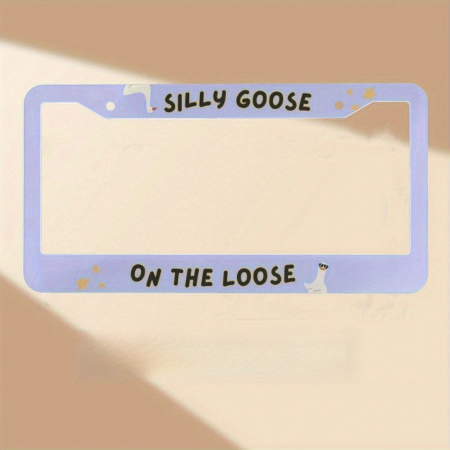 1PC Soft Blue "Silly Goose Escapes" License Plate Frame- Plastic- Vibrant- Easy To Install- Standard Size Fits Most Vehicles- Novelty Decoration For Car Enthusiasts 12. 2X 6. 3inch 31. 3x 16cm Ch