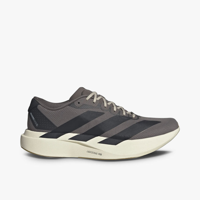 adidas adizero EVO SL. Side view of Charcoal running shoes Night Grey three-stripes and Lightstrike Pro foam midsole.