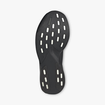 adidas adizero EVO SL Zip-Up. Bottom view of Black running shoes showing dark rubber traction outsole with white foam cutouts.