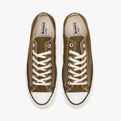 Converse Chuck 70 Canvas. Top view of pair of bog down canvas sneakers showing white laces, textile lining, and inner sole branding.