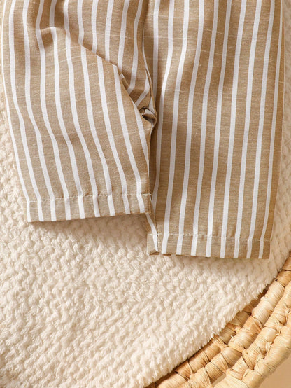 Newborn White Long-Sleeve Collared Shirt With A Small Bear Design, Paired With Apricot-Colored Pants