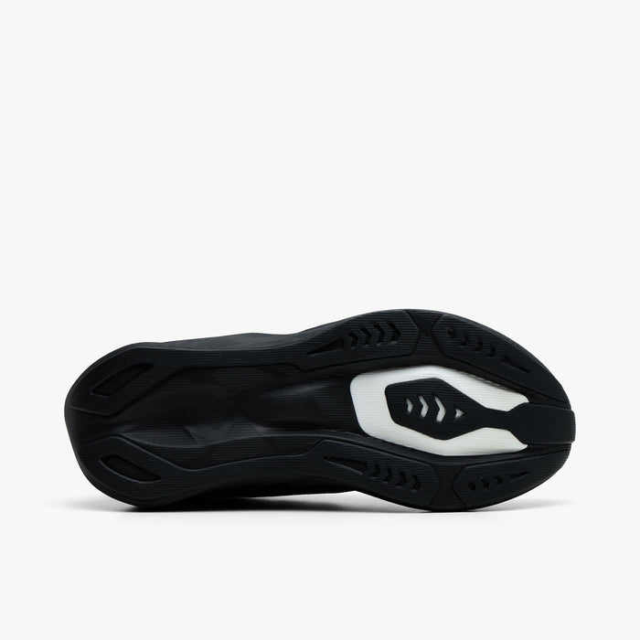 ASICS NOVABLAST 6. Bottom view of black running shoe showing segmented outsole with grey centre detail and textured tread.