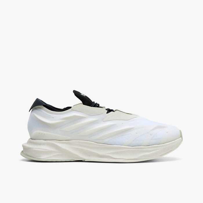 adidas Terra Mono. Side view of white, off white and black sneaker with sculpted upper, black collar and thick layered sole.