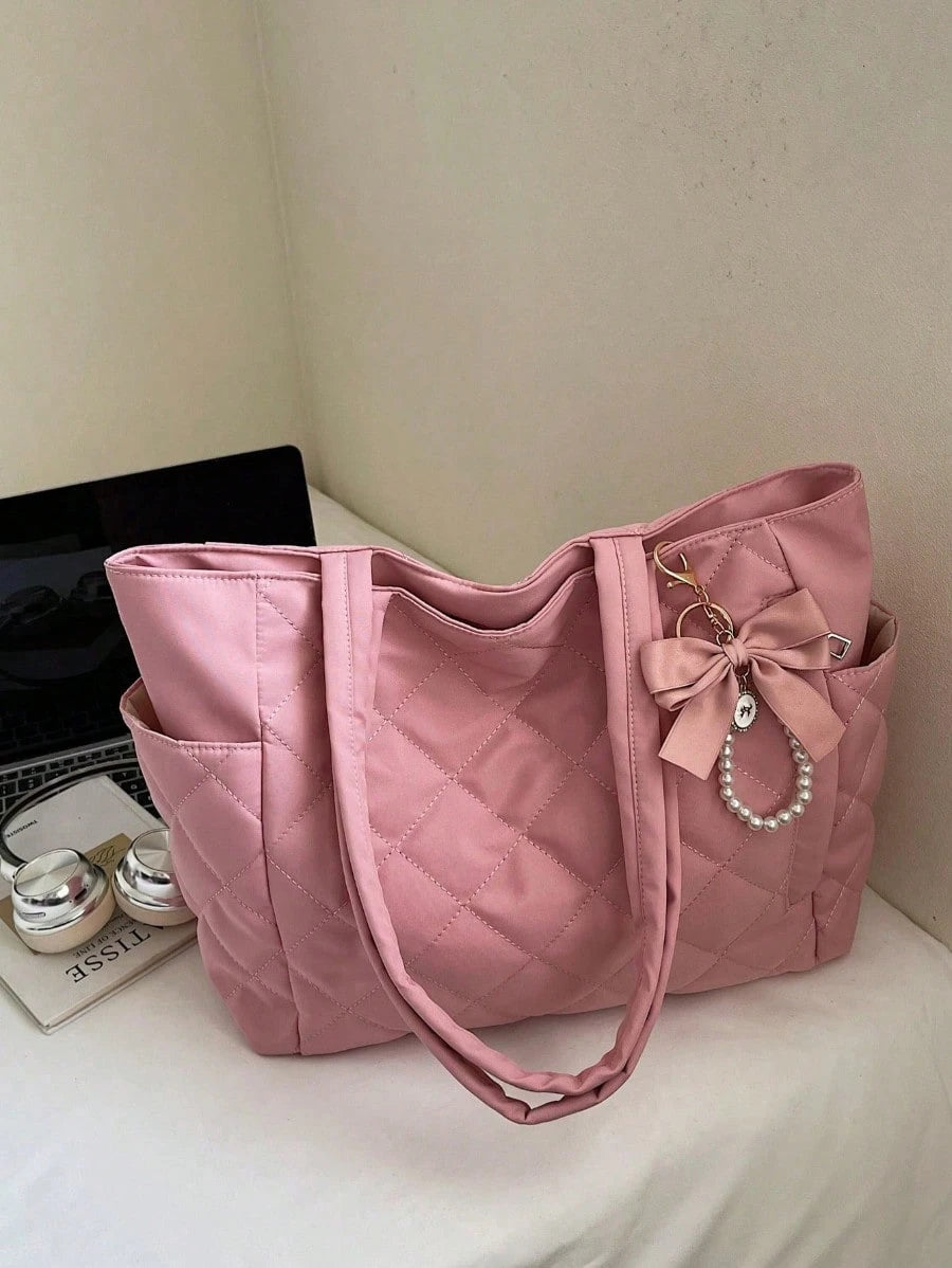 This Brand New Classic Fashionable Large Capacity Solid Color Shoulder Bag Features A Dual-Handle Design, Quilted Craftsmanship, And A Butterfly Faux Pearl Pendant, Making It Lightweight And Easy To C