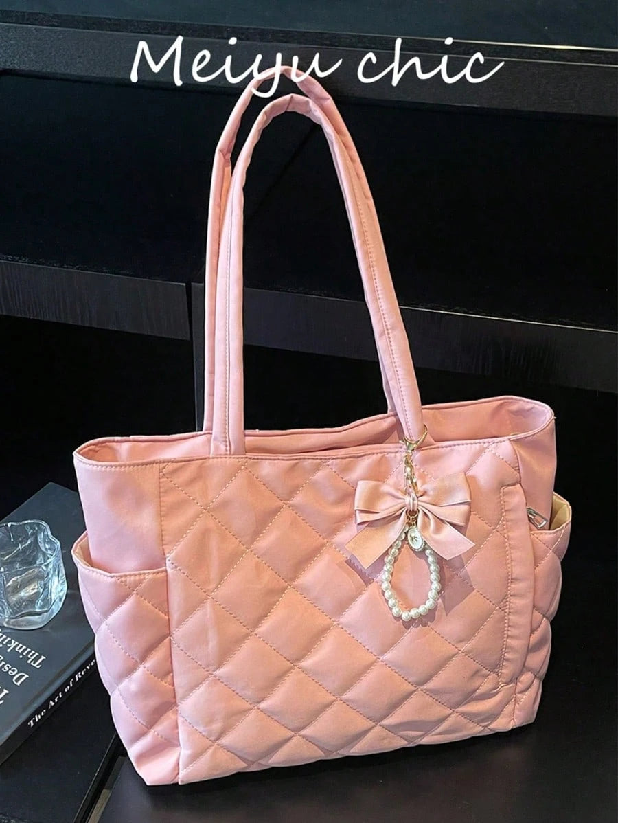 This Brand New Classic Fashionable Large Capacity Solid Color Shoulder Bag Features A Dual-Handle Design, Quilted Craftsmanship, And A Butterfly Faux Pearl Pendant, Making It Lightweight And Easy To C