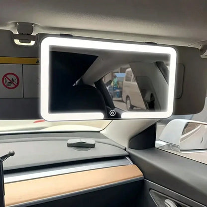 This Car Vanity Mirror Features 3 Lighting Modes, A Portable LED Design, A White Exterior With A High-Definition Protective Film, A Dimmable Touchscreen, And USB Charging.