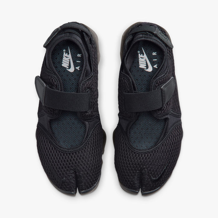 Nike Women's Air Rift Mesh. Top view of pair of black split-toe shoes showing midfoot straps, textile lining, and white Nike Air inner sole branding.