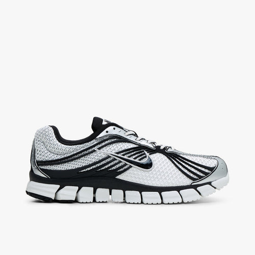 Side Nike Zoom Skylon 11. Side view of Summit White mesh running shoes with Black cage overlays, Nike Swoosh on the sidewall, and segmented midsole.