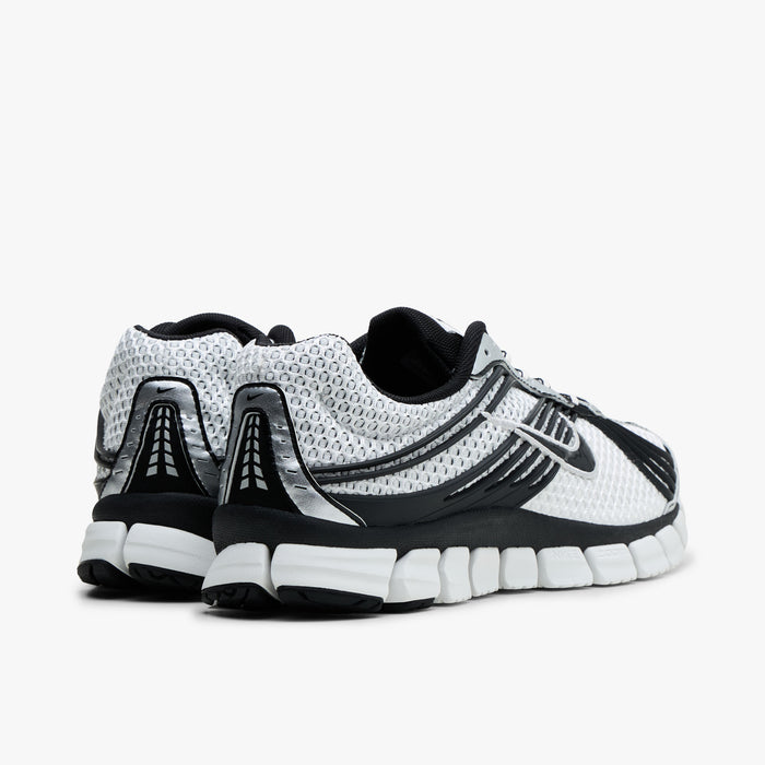 Nike Zoom Skylon 11. Rear view of Summit White and Light Smoke Grey mesh running shoes showing Black heel overlays and white segmented foam midsole.