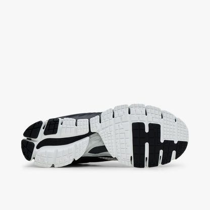 Nike Zoom Skylon 11. Bottom view of Summit White running shoes showing Black and White segmented rubber traction outsole.